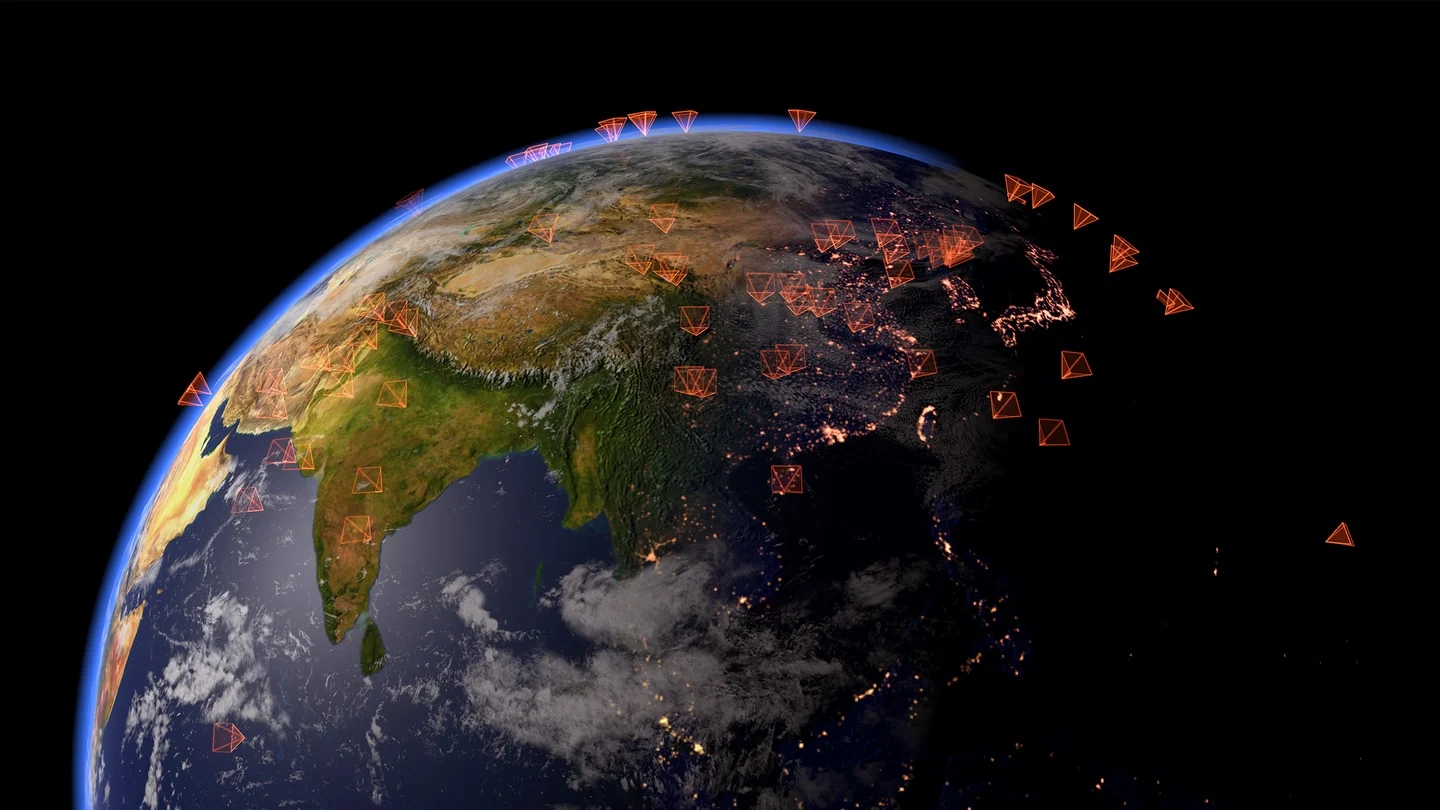 Digital Earth surrounded by red triangular markers in On the Morning You Wake.