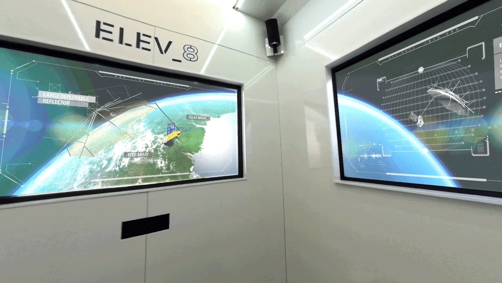 Two screens inside the Airbus ELEV8 cabin displaying Earth and satellite graphics.