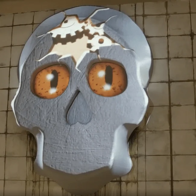Projected cartoon skull with orange eyes and a cracked forehead on a tiled wall.