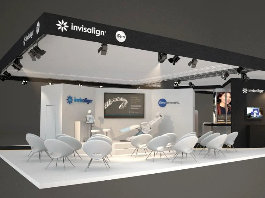 Invisalign exhibition stand with lounge seating and a large presentation screen.