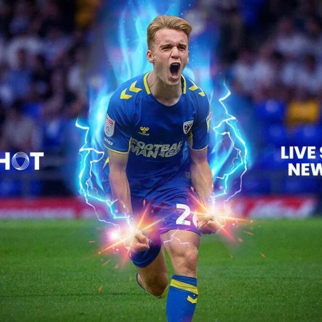 Footballer in a blue kit with glowing energy effects for Trickshot.
